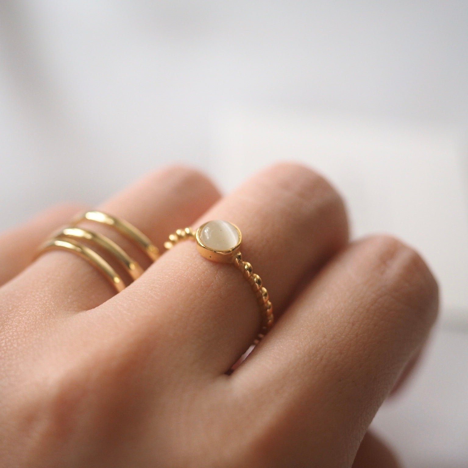 stunning-white-opal-stone-on-gold-ring.jpg